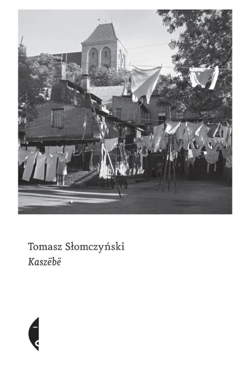 Kaszebe w.2, Tomasz Słomczyński